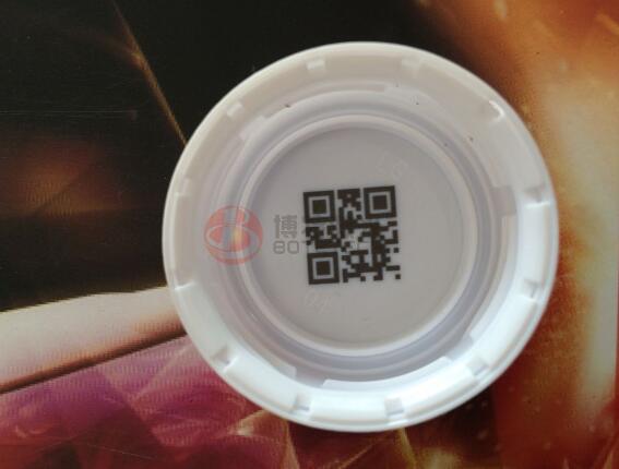 飲料瓶蓋在線激光噴碼機解決方案